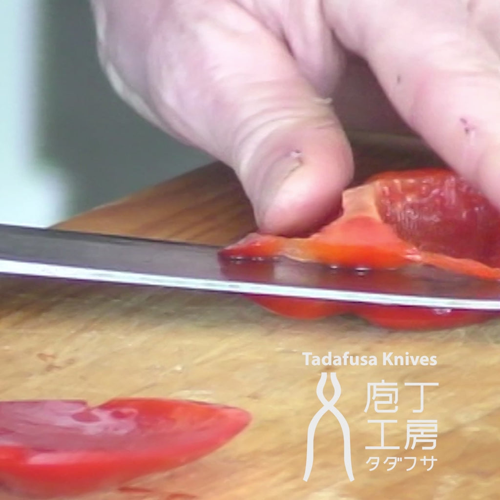Japanese kitchen knife Santoku juliennes capsicum